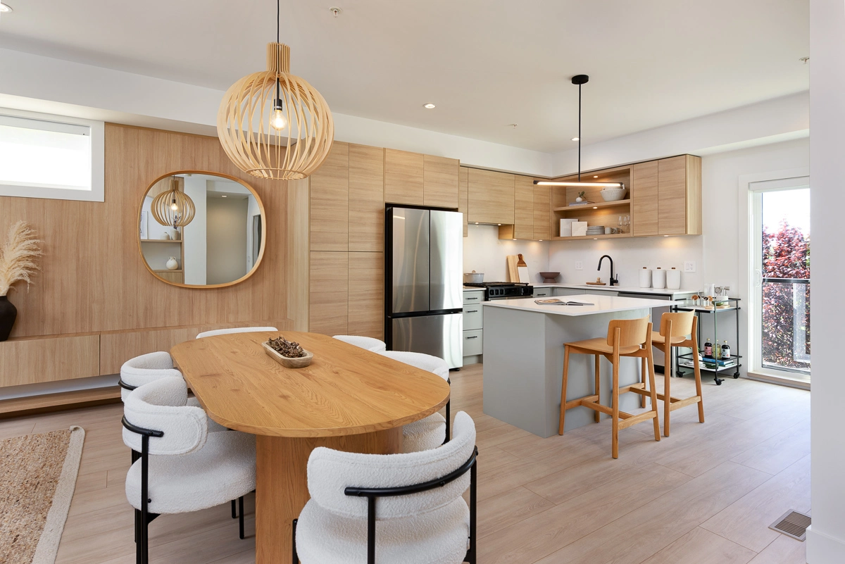 Plan A – open dining and kitchen with oak table and pendant light