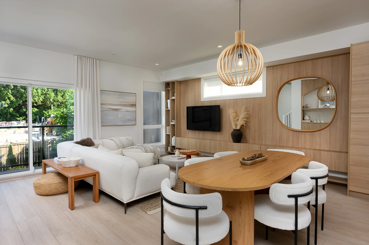 Plan A – main living area looking out to balcony with white sectional